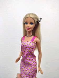 Barbie doll with pink dress