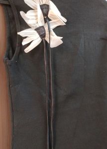 Sleeveless Top with Floral Detail