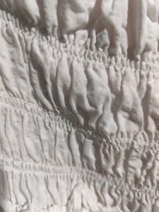 white smocked ruffle crop top