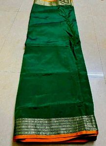 Dark green pure silk saree