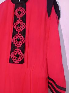 Vibrant Kurti with Black Embellishments