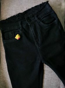Stylish Black Jeans with Frayed Hem