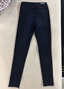 High-Waisted Black Button-Fly Jeans