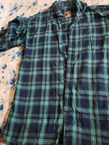 Classic blue and teal checkered full-sleeve shirt.
