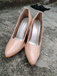 Elegant Nude Patent Leather Stilettos