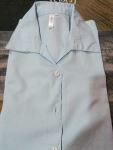 Light Blue Collared Button-Up Shirt