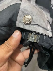 nike lightweight silver jacket