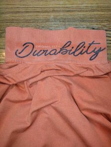 Orange Polo T-Shirt by Logic Goods and Garments