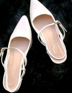 White Pointed Slingback Heels.