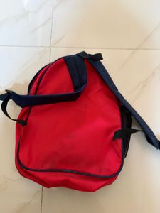 Kids Red Backpack with Dolphin Logo