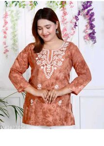 Embroidered Orange Kurti with White Pants