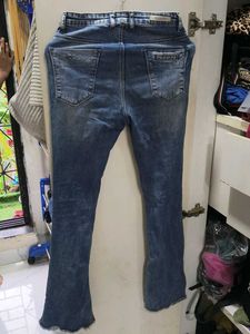 Distressed Flare Jeans