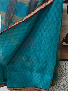 Pretty Blue Saree With Bright Red Border