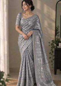 Elegant Silver Saree with Intricate Embellishments