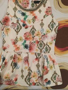 Floral Print Embellished peplum top