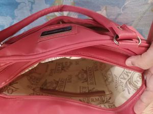 Quilted Pink Handbag with Embellishments
