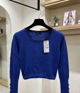 Blue Long Sleeve Knit Top with Button Detail
