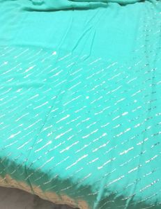 Brand New Turquoise Sequined saree &amp; blouse