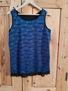Elegant Blue Lace Top with Black Skirt