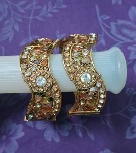 Intricate Gold-Tone Bangles with Stones