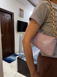 Animal print shoulder bag with chain