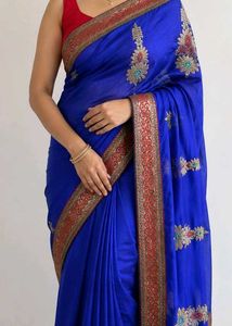 A Saree In Colour Navy Blue With Flower Design