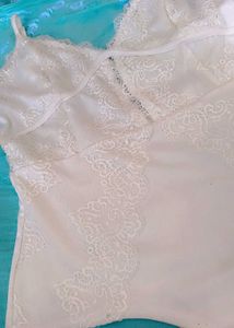 Elegant White Lace Bodysuit
