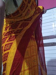 red and yellow saree