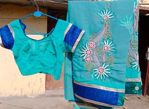 Elegant Teal Embroidered Saree & Blouse