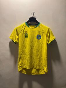 women’s yellow Brazil soccer jersey