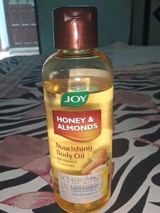 Joy Nourishing Body Oil With VITAMIN E And Sunscreen