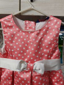 Cute peach Pink Polka Dot satin frock with Bow