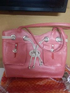 Stylish Pink Handbag with Drawstring Detail