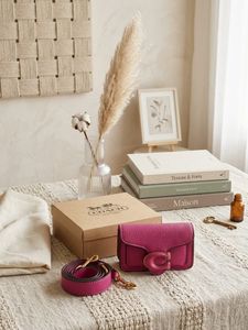 Coach Pink Pebble Leather Crossbody Bag