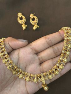 Elegant Gold Necklace and Earring Set