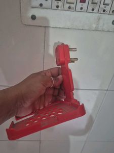Red phone Shelf while charging