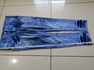 Distressed Blue Denim Jeans