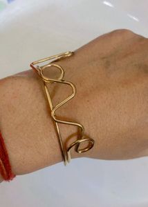 Unique "Love" Word Bangle Bracelet