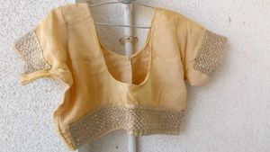 creame embellished saree with matching blouse