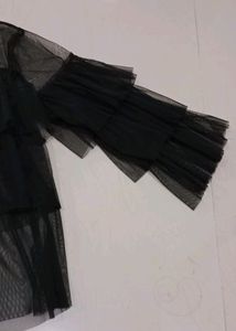 Black ruffled mesh top
