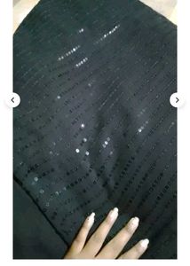 Black Saree With Padded Sleevless Blouse.