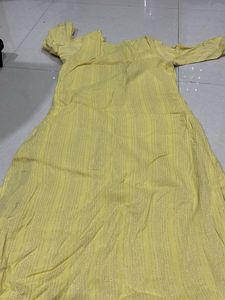 Elegant Yellow Kurta with Intricate Embellishments