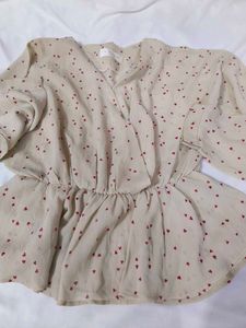 Chic Beige Heart Print Peplum Top