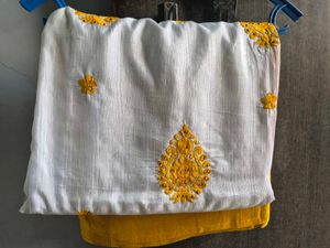 Elegant White Saree with Yellow Embroidery