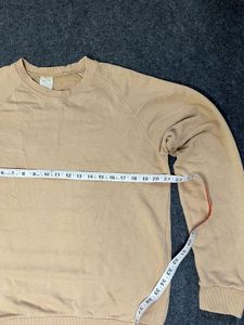beige sweatshirt