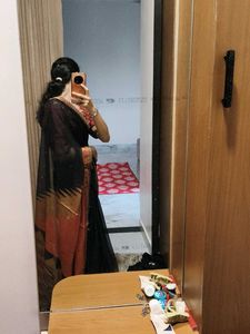 Elegant Black Saree with Red Blouse