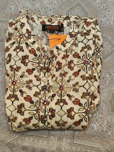 Elegant Cream Kurti with Floral Embroidery