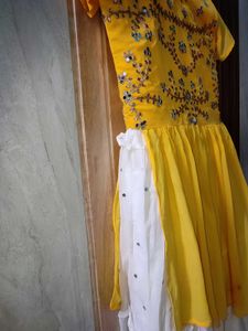 elegant white mirror work lehnga and yellow mirro