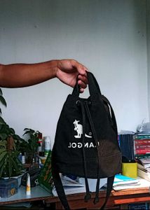 kangol bucket drawstring sling bag
