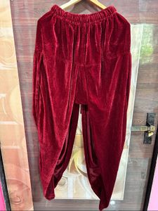 Men’s white sherwani with red velvet dhoti